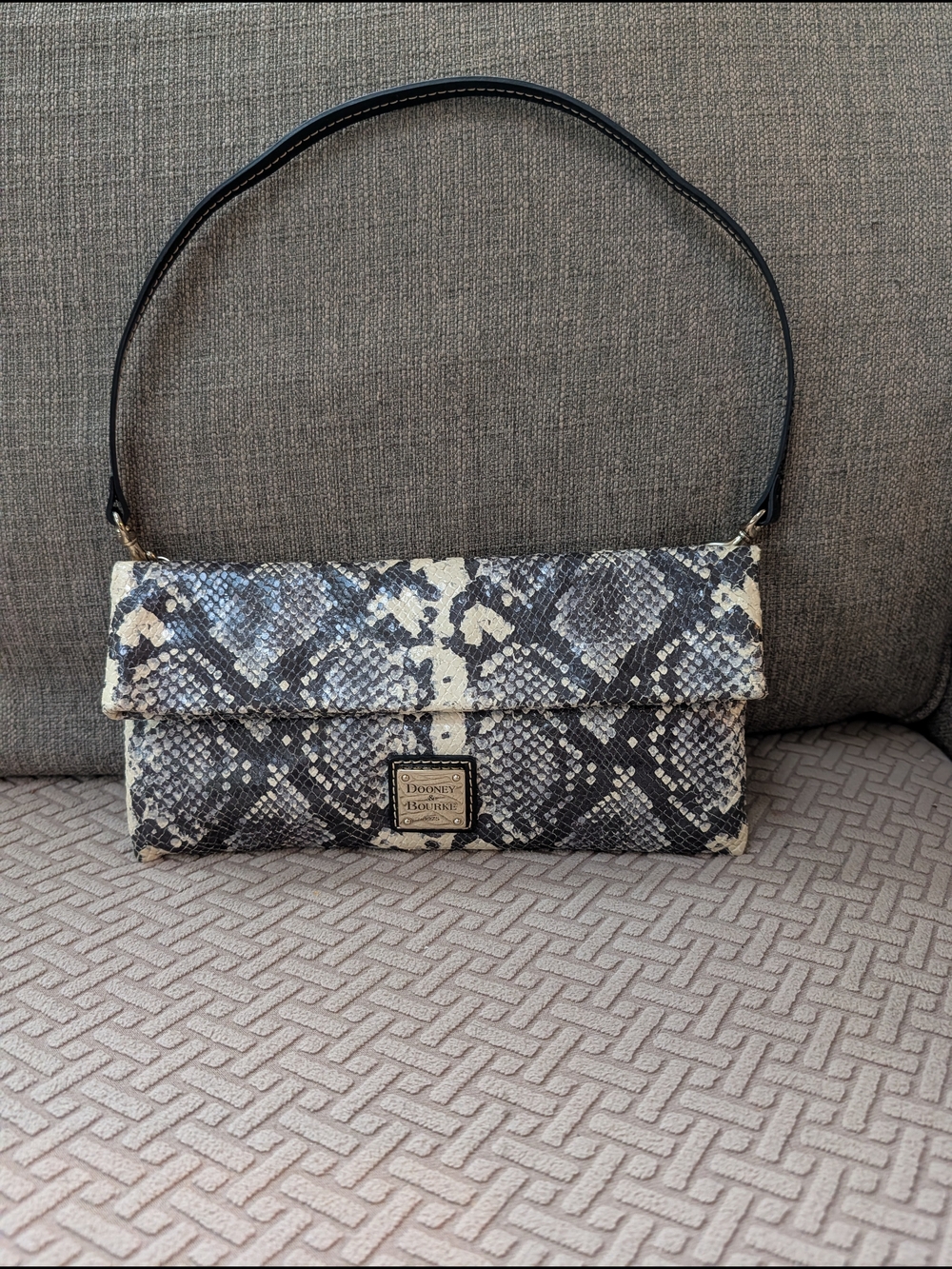 Dooney & Bourke Black and Cream Snake-Print Embossed Leather Clutch EUC